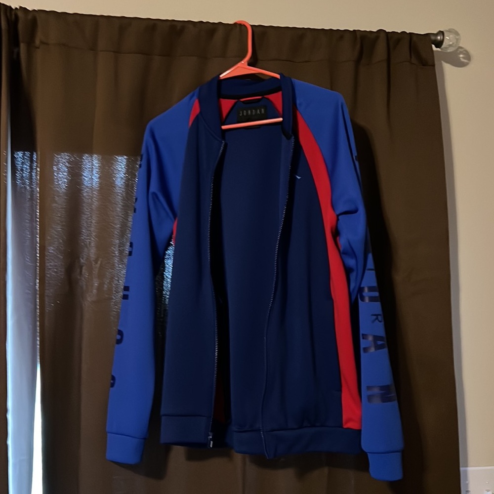 Jordan jacket worn only one time. Size small in blue